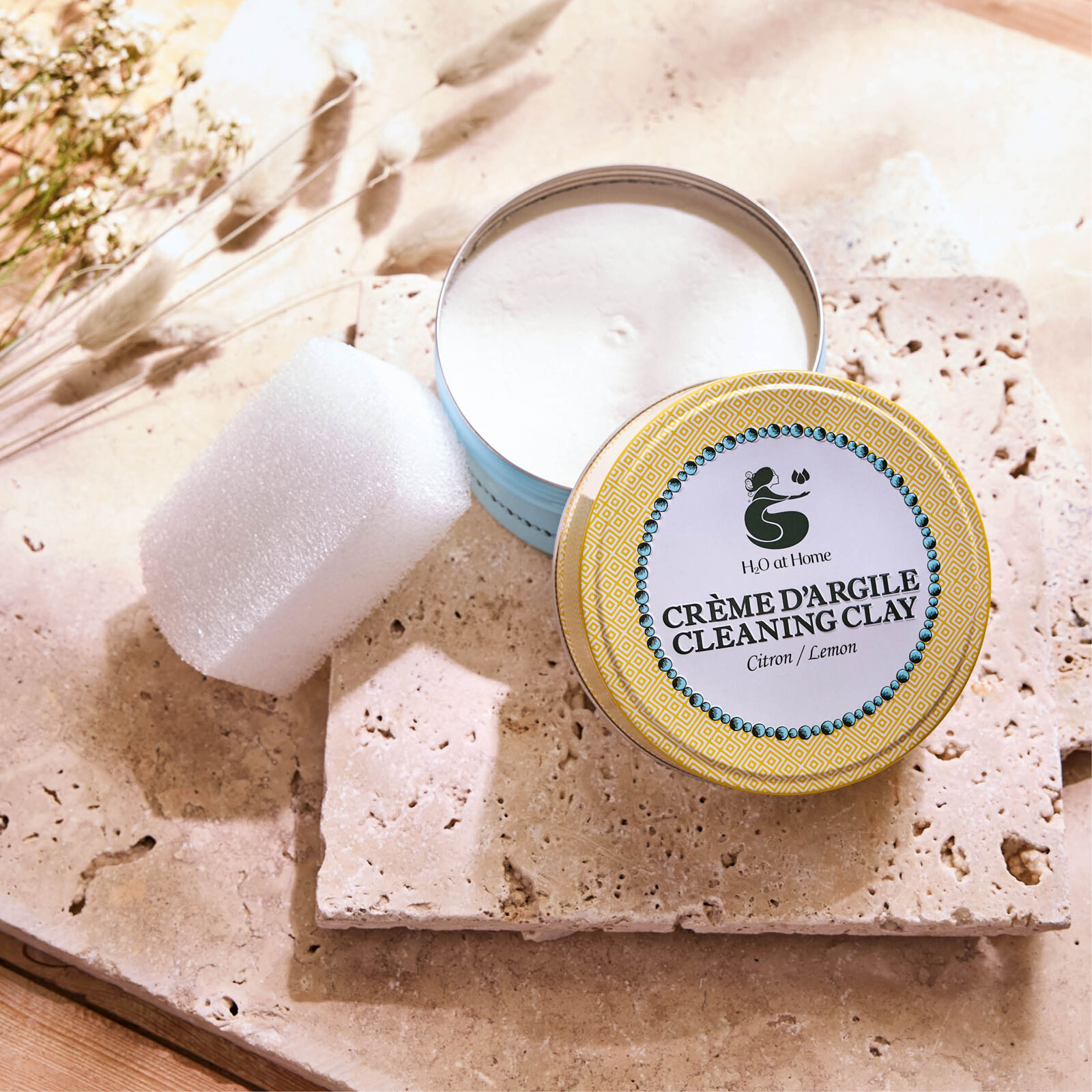 H2O at Home refillable Crème d'Argile — the mineral clay cleaner ships in a pump bottle designed to be refilled with pouches rather than re-bought